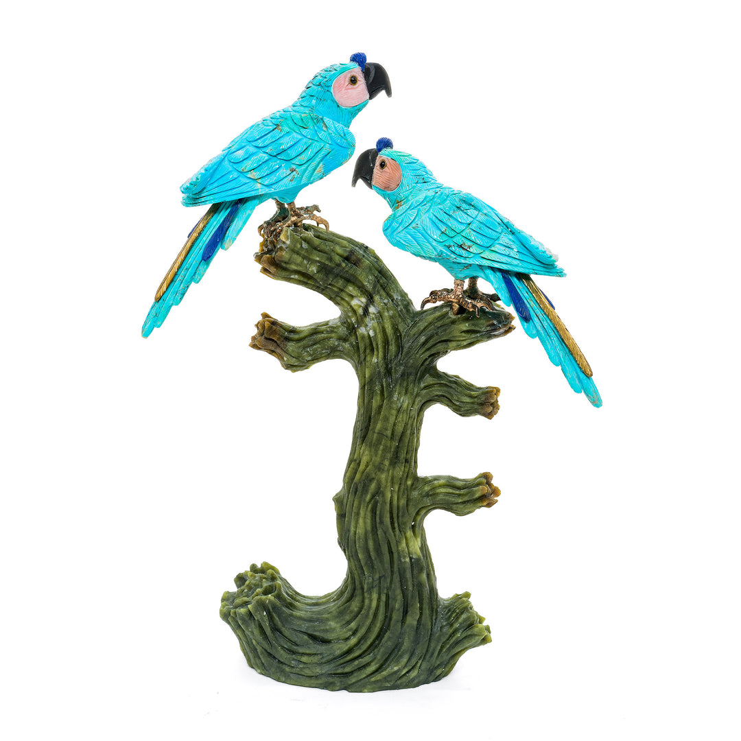 Genuine turquoise parrot sculpture on naturalistic tree base.