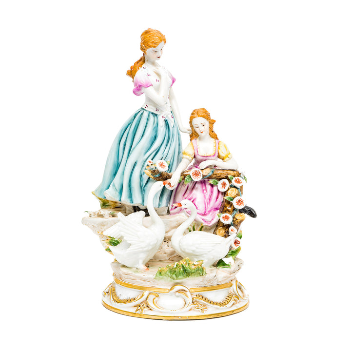 Graceful Companions porcelain figurine by Dresden featuring two ladies and swans.