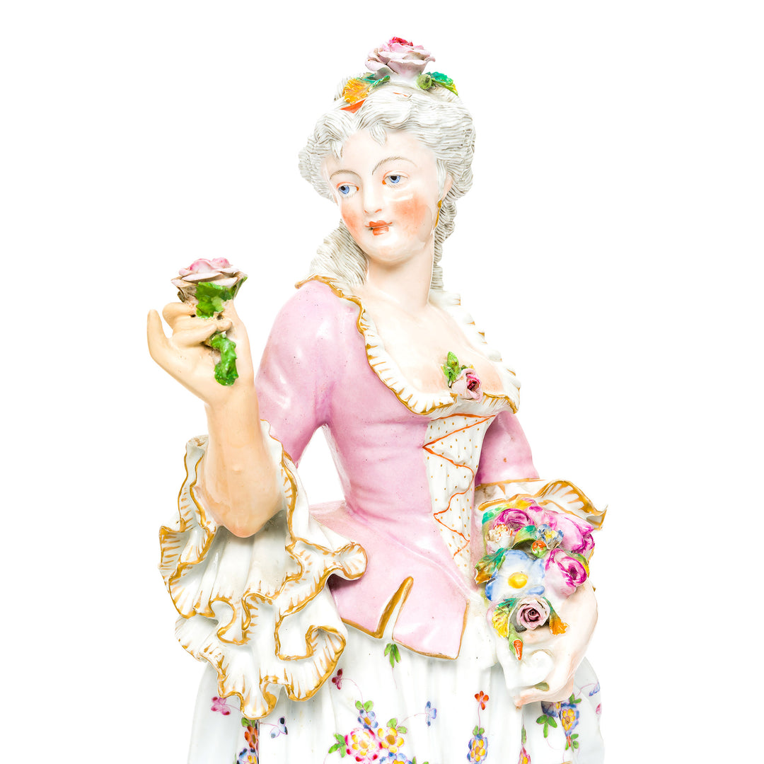 Graceful lady accepting flowers in Rococo porcelain art.