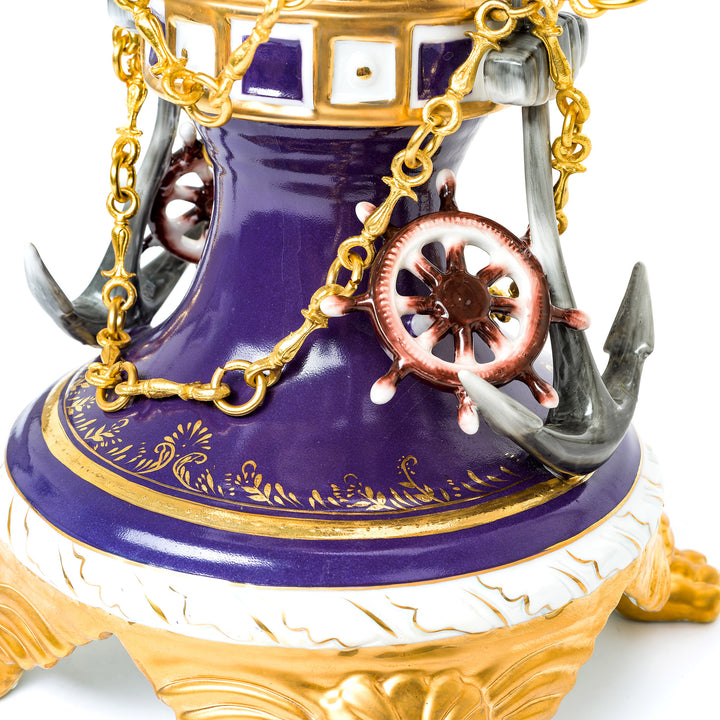 Hand-crafted vase with intricate floral designs and gold detailing