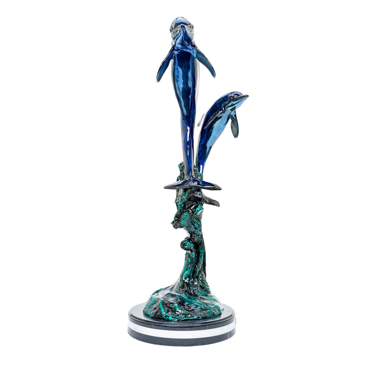 Luxurious bronze dolphin sculpture by Muzika with intricate detailing.