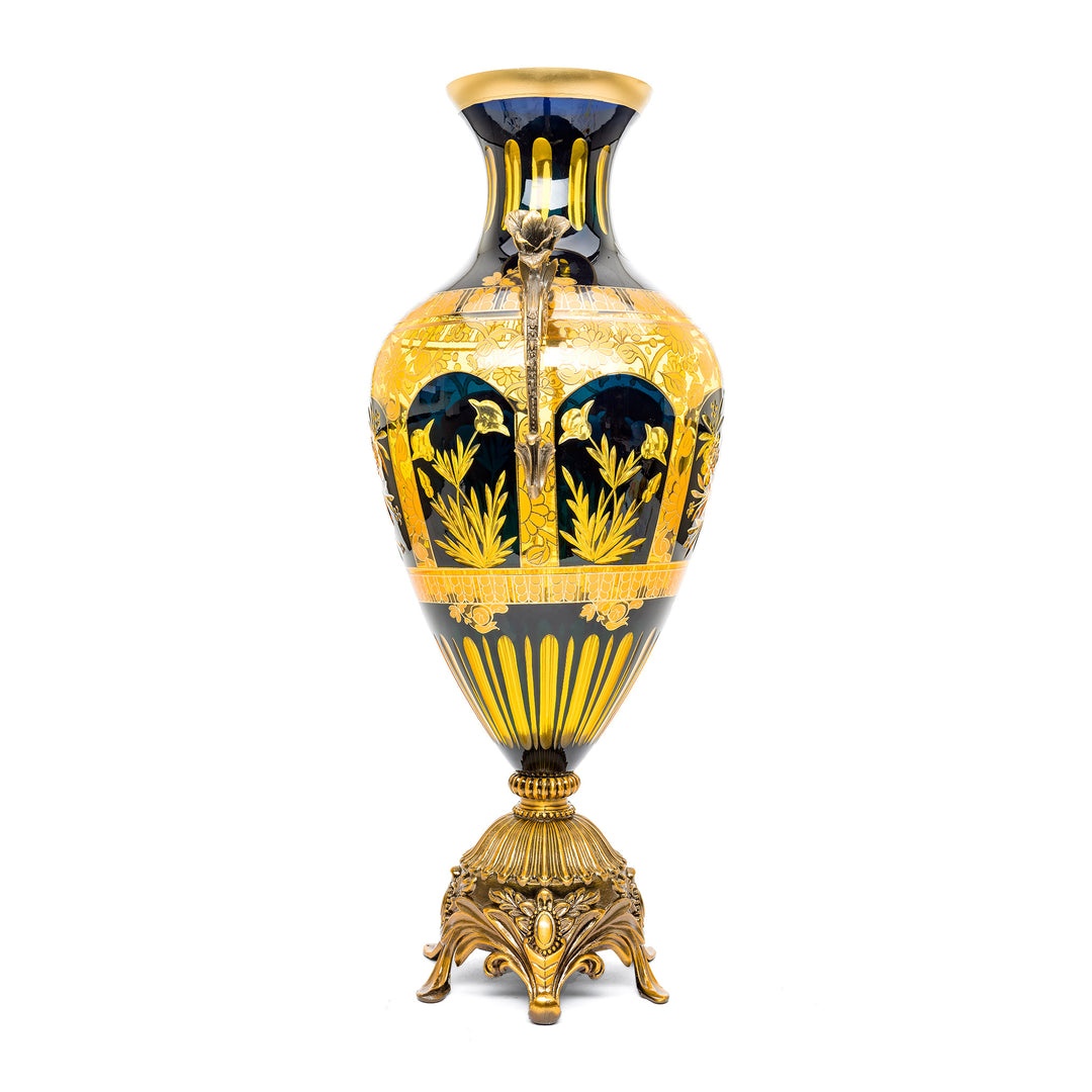 Luxurious hand-cut crystal vase with 24kt gold accents and rose handles.