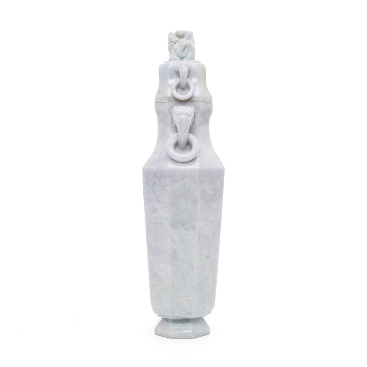 Exquisite jade vase featuring a sculpted Foo Dog lid