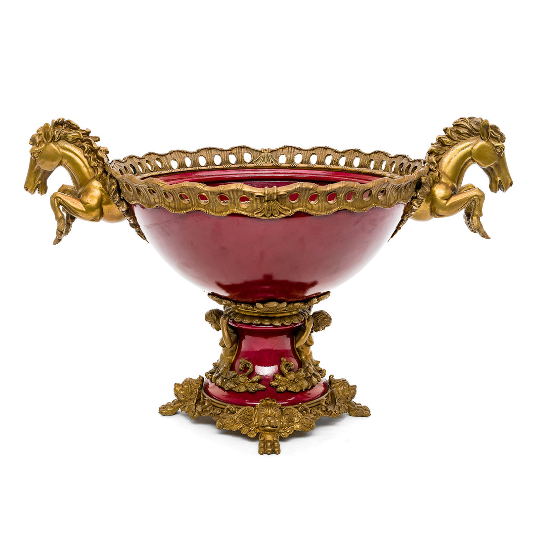 Majestic red porcelain bowl with golden horse accents.