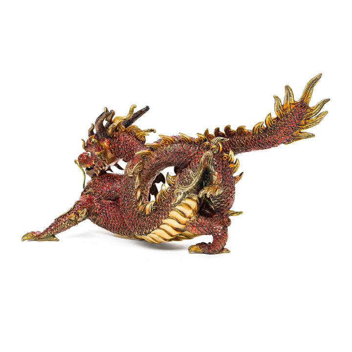 Mythical bronze dragon with custom red patina finish and golden accents.