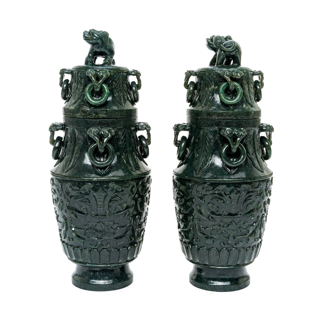 Pair of Spinach Green Jade Vases showcasing detailed traditional motifs.