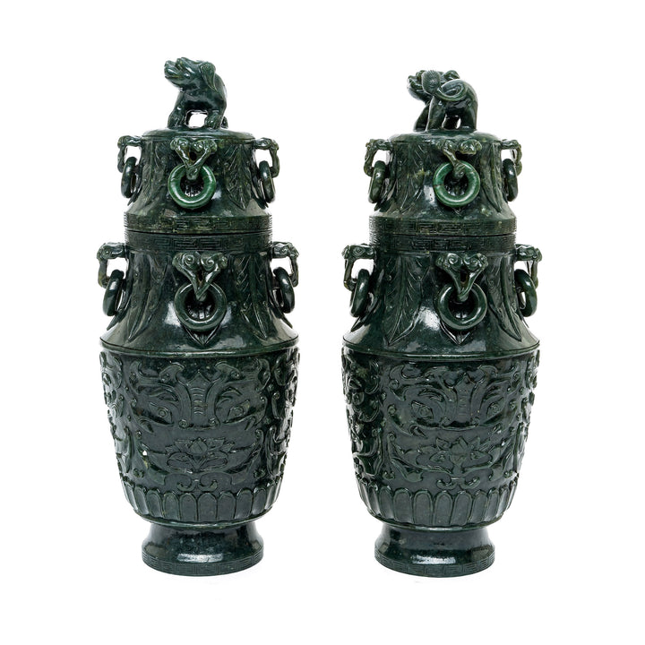 Pair of Spinach Green Jade Vases showcasing detailed traditional motifs.