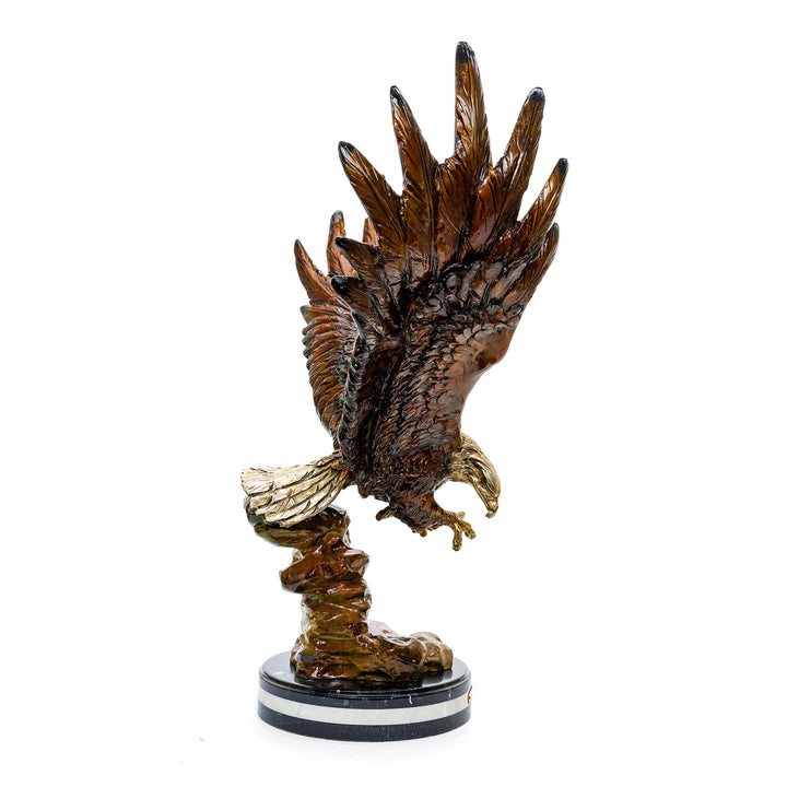 Powerful eagle sculpture with custom patina and elegant marble base.