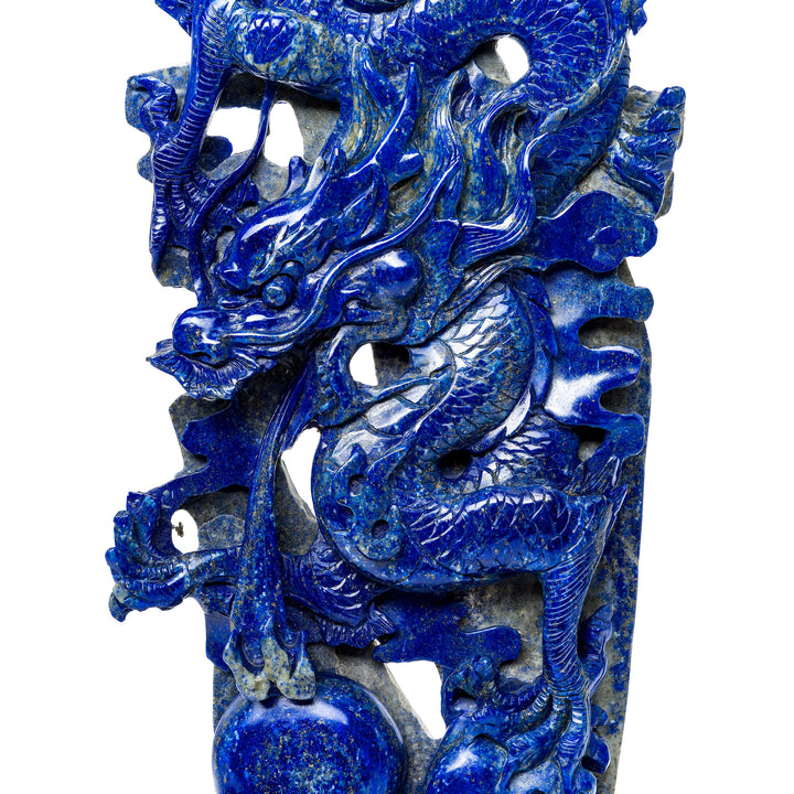 Sodalite dragon coiled around a mystical orb, mounted on a wooden base.