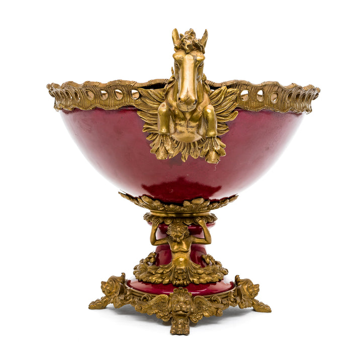 Striking red porcelain bowl with intricate golden accents and horse design.