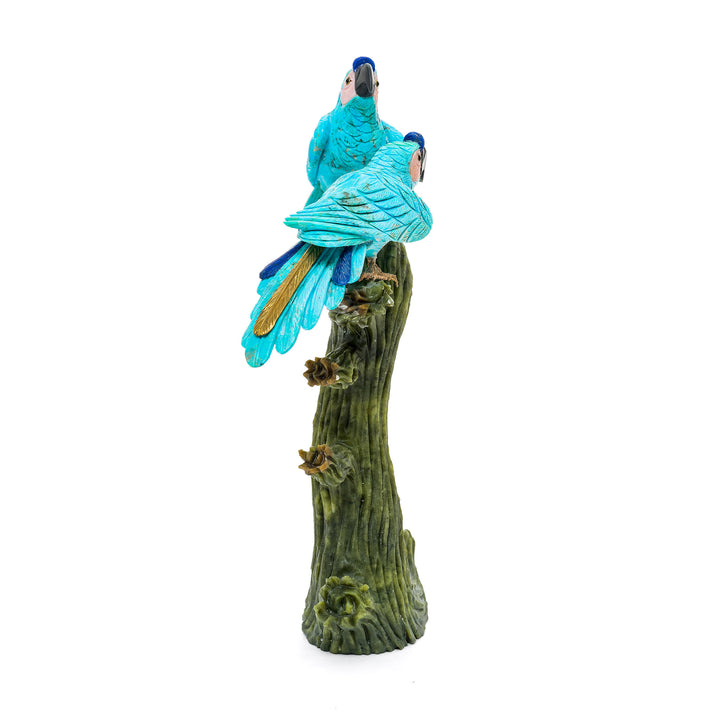 Turquoise bird sculpture with realistic detailing.