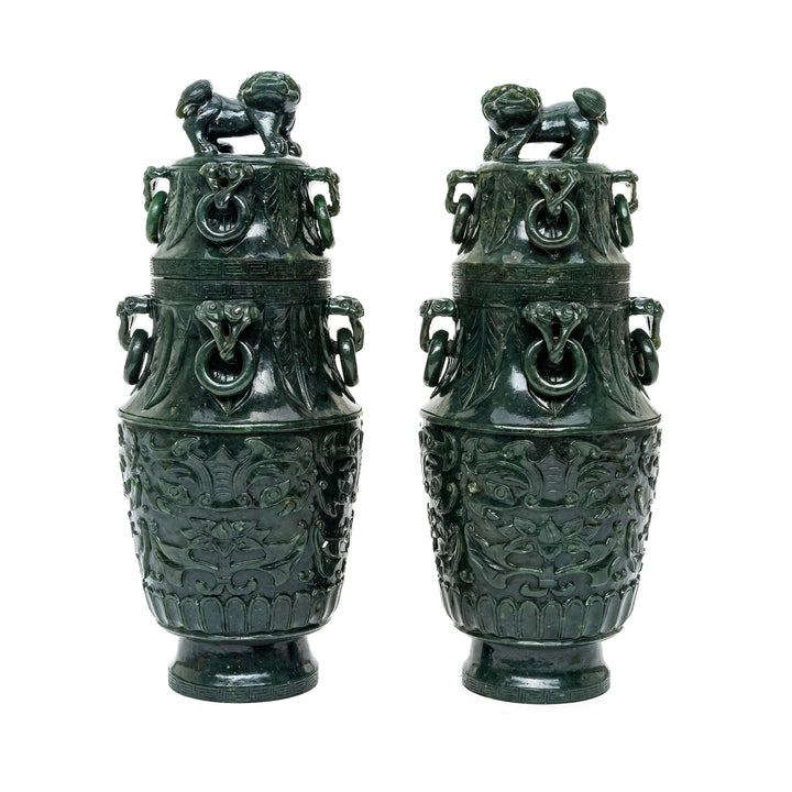 Vintage Spinach Green Jade Vases with intricate carvings and foo dog finials.