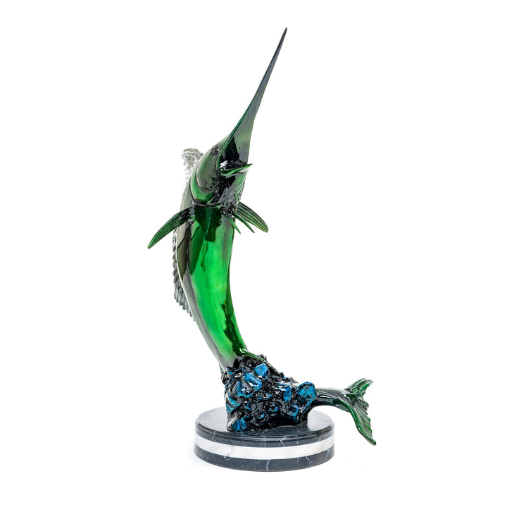 Vivid green patina marlin sculpture on a polished marble base.