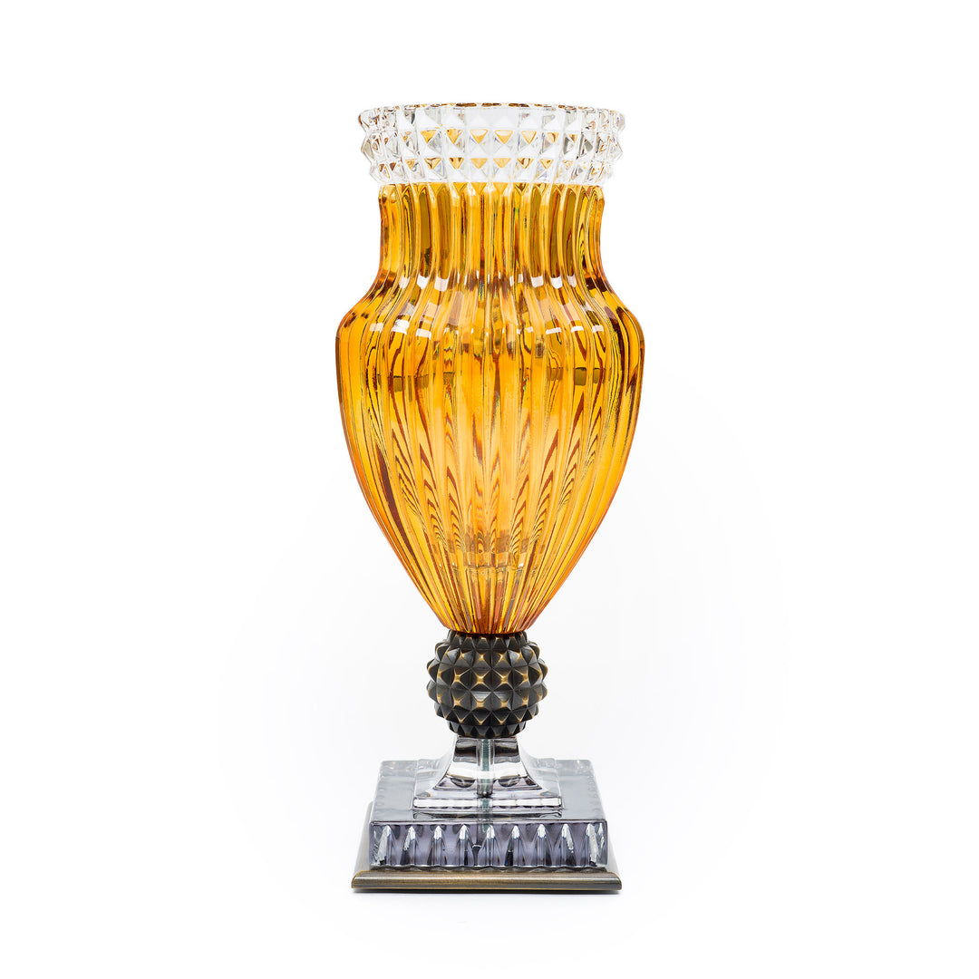 Amber-hued crystal vase with ribbed detailing and cutwork rim