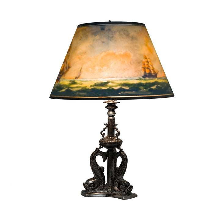 Ambient glow from sea scene glass lamp shade