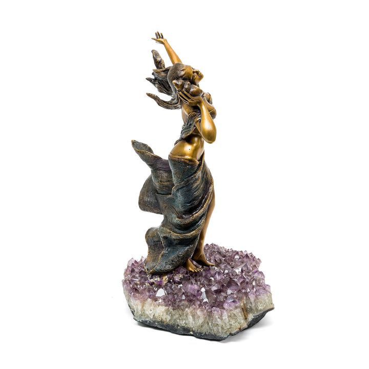 Amethyst crystal cluster supporting sea muse sculpture