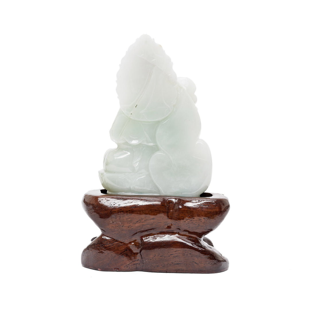 Back of jade Guan Yin sculpture on stand
