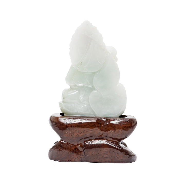 Back of jade Guan Yin sculpture on stand