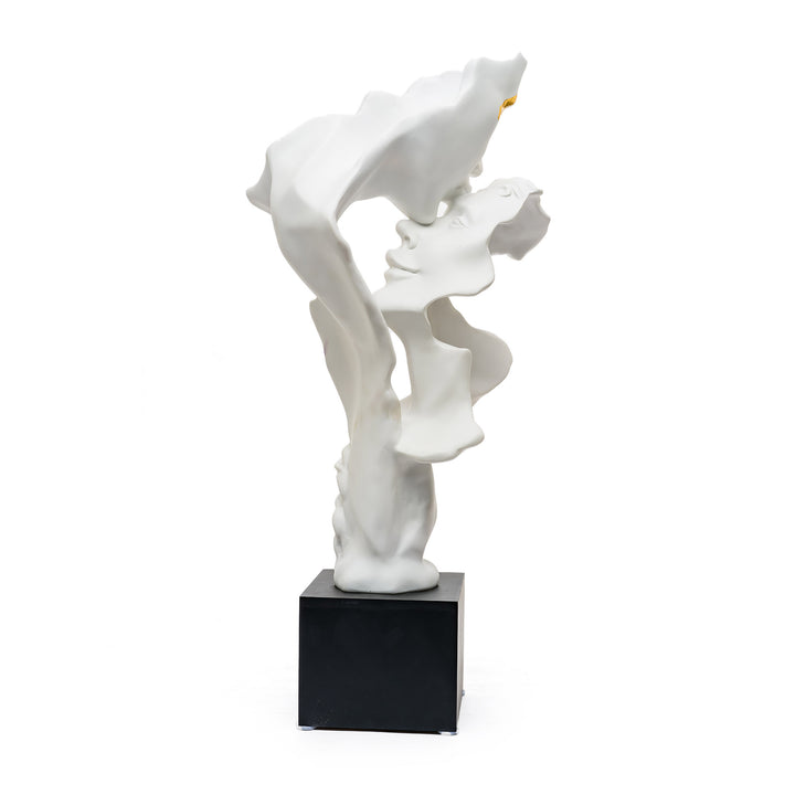 Back view of porcelain kiss sculpture showing elegant curves