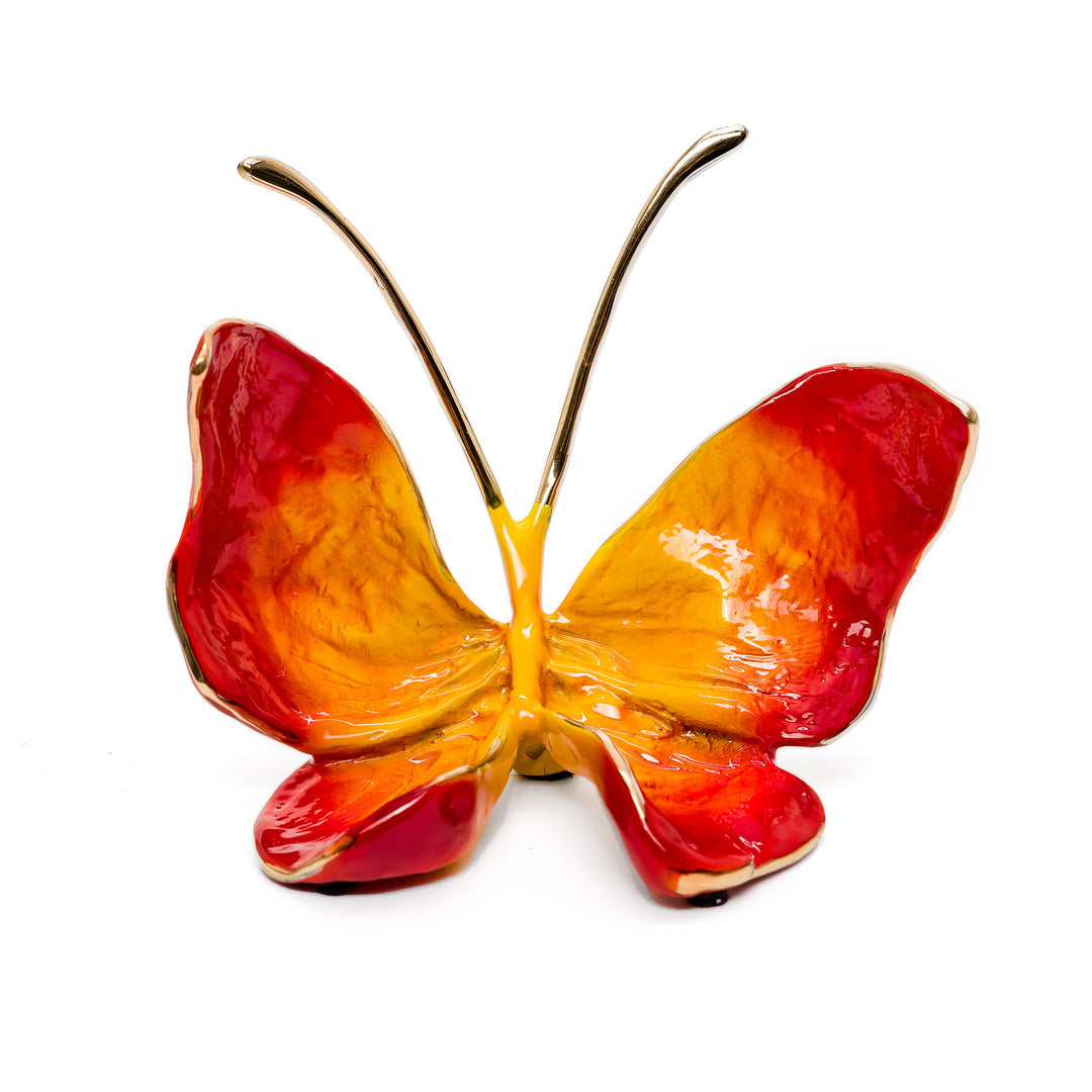Bronze butterfly sculpture in fiery red and orange patina