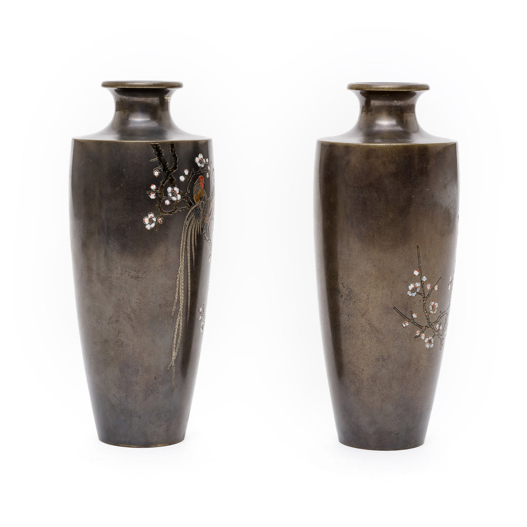 Back view of the inlaid bronze vases featuring minimalistic design