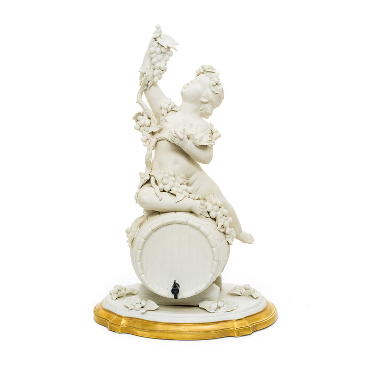 Capodimonte porcelain cherub sculpture with intricate grapevine detailing