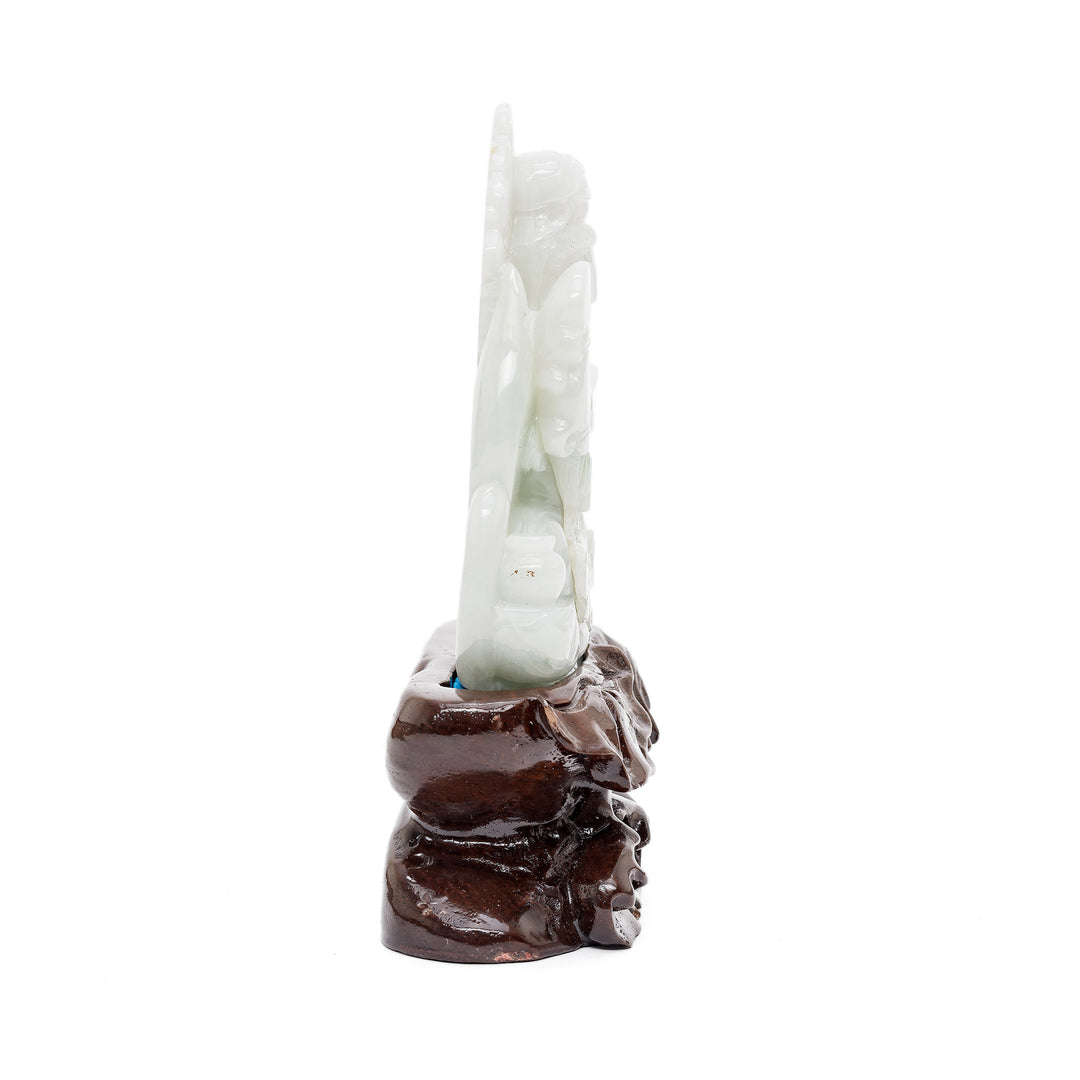 Carved jade goddess of mercy with offering urn