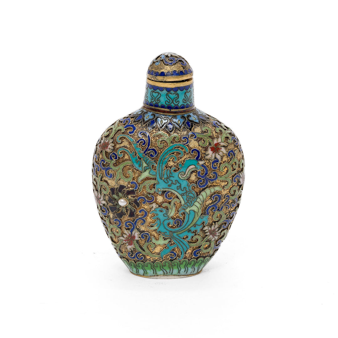 Rear view of Cloisonné snuff bottle with intricate enamel scrollwork