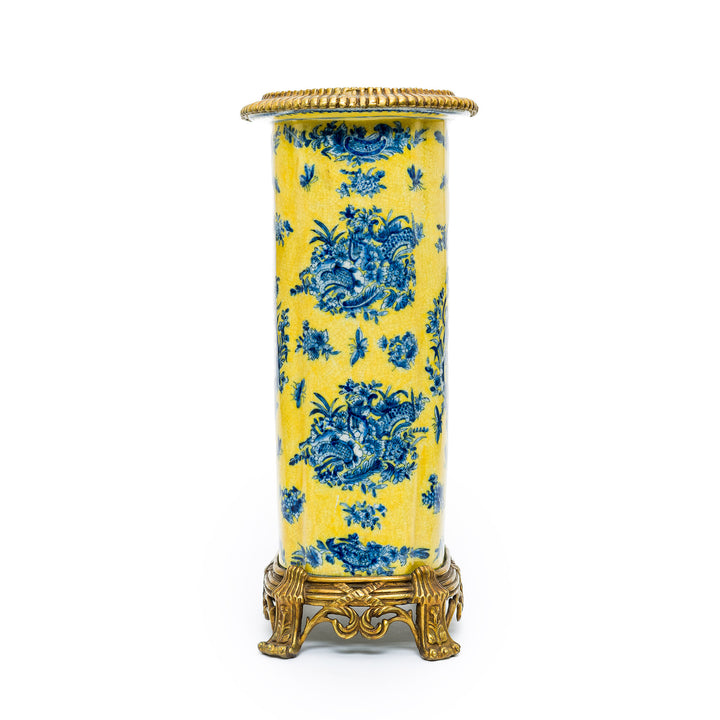 Side view with cobalt pastoral sprays on yellow porcelain