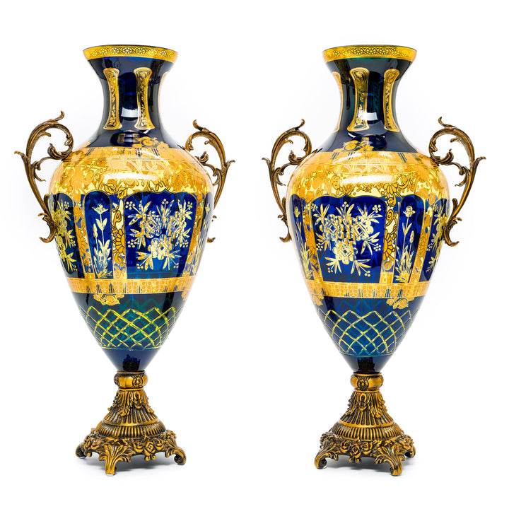 Pair of cobalt vases with intricate gold floral detailing