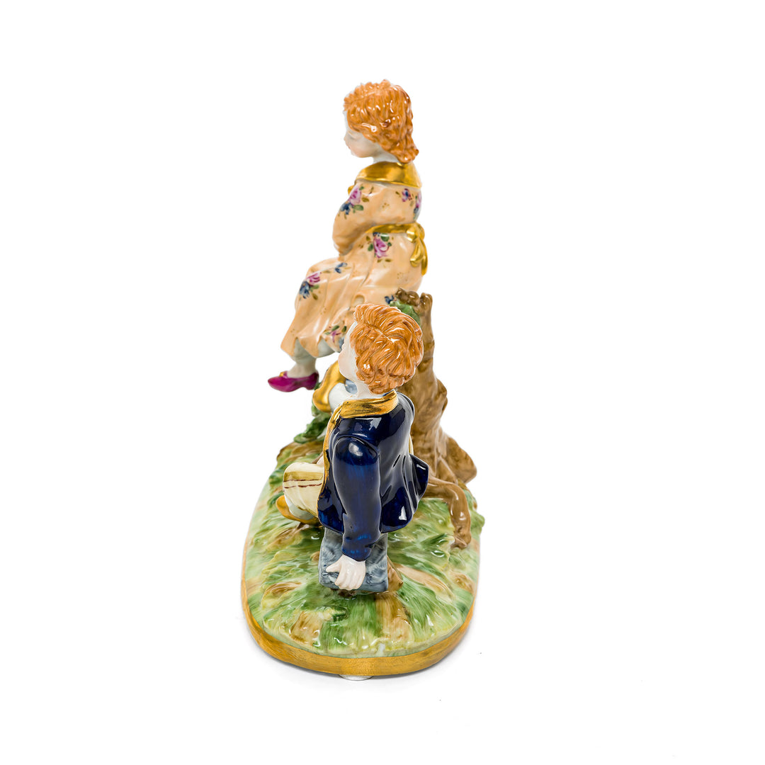 Collectible Seesaw Children porcelain figurine, a whimsical display piece.