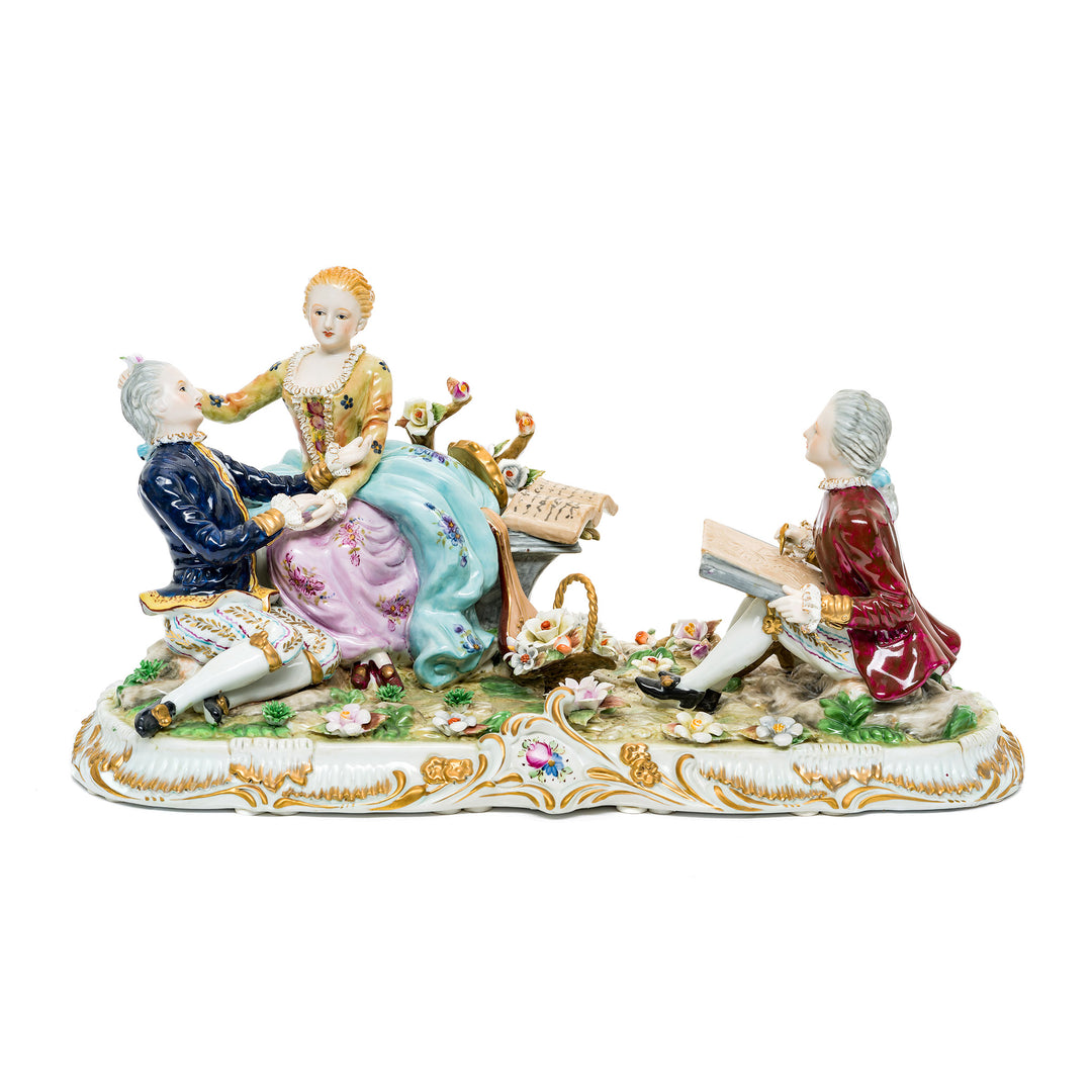 Courting Trio Music and Poetry German porcelain figurine depicting an elegant scene of aristocratic romance.