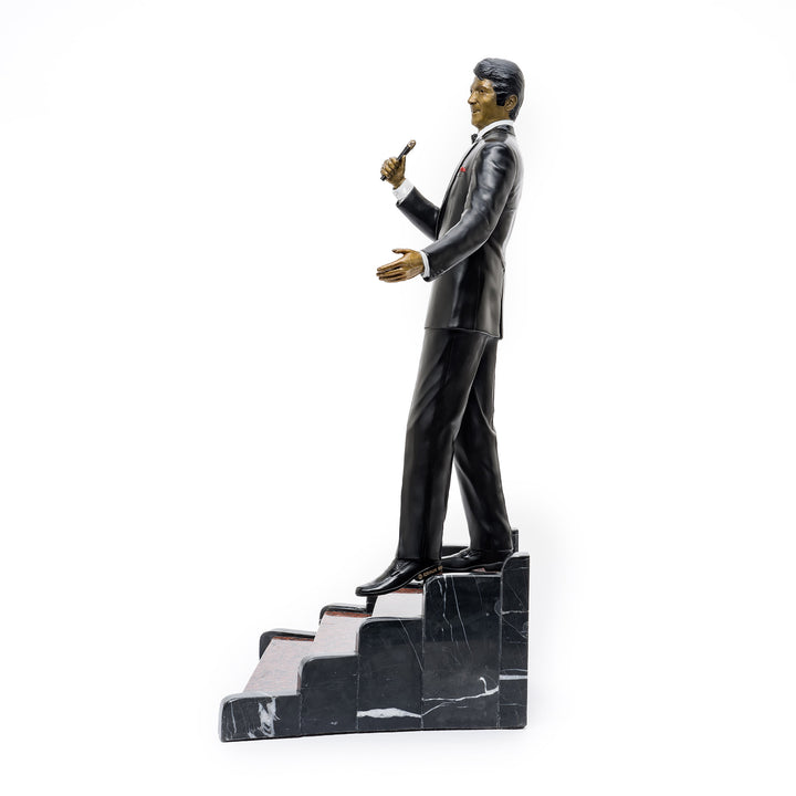 Side profile of Dean Martin bronze statue on luxury base