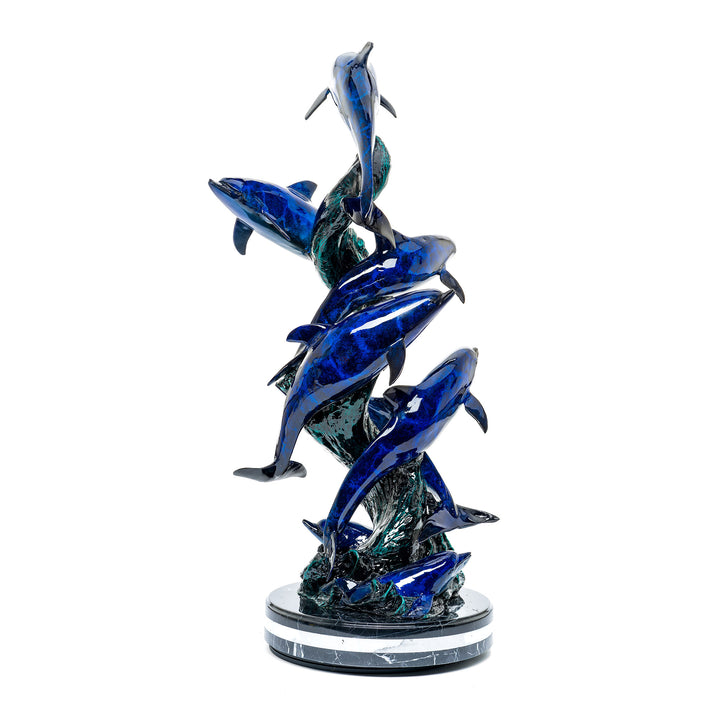 Dolphins family patina sculpture with rich blue and green tones.