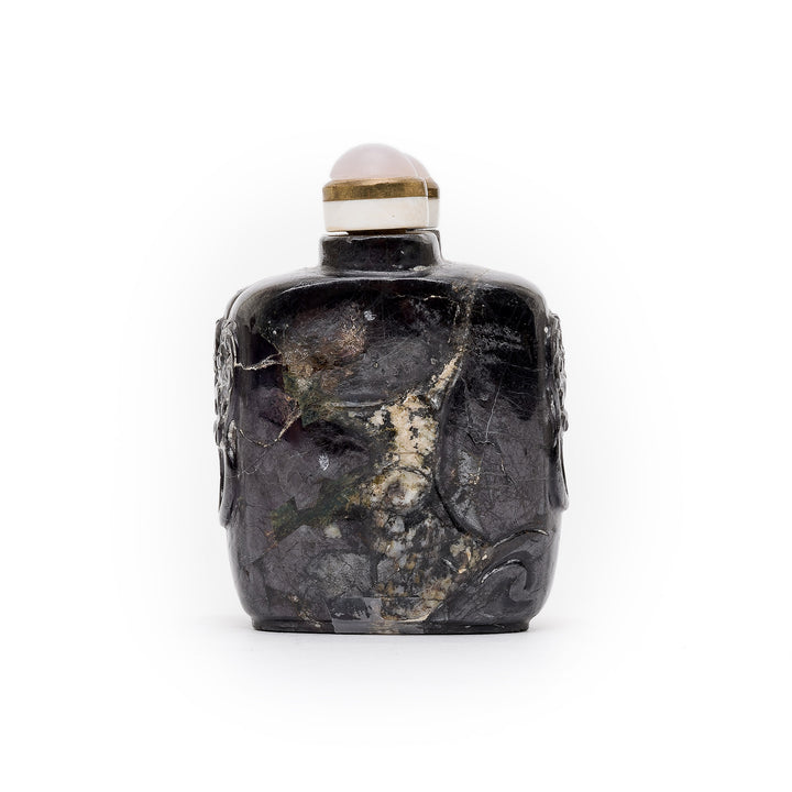 Front view of double black stone snuff bottle with rose quartz stoppers