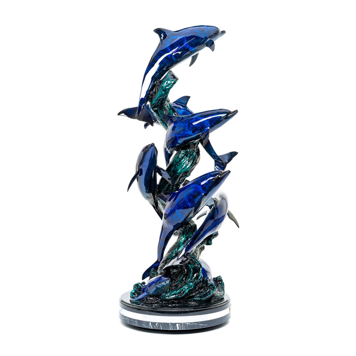 Dynamic bronze dolphins sculpture with custom candy-coated finish.