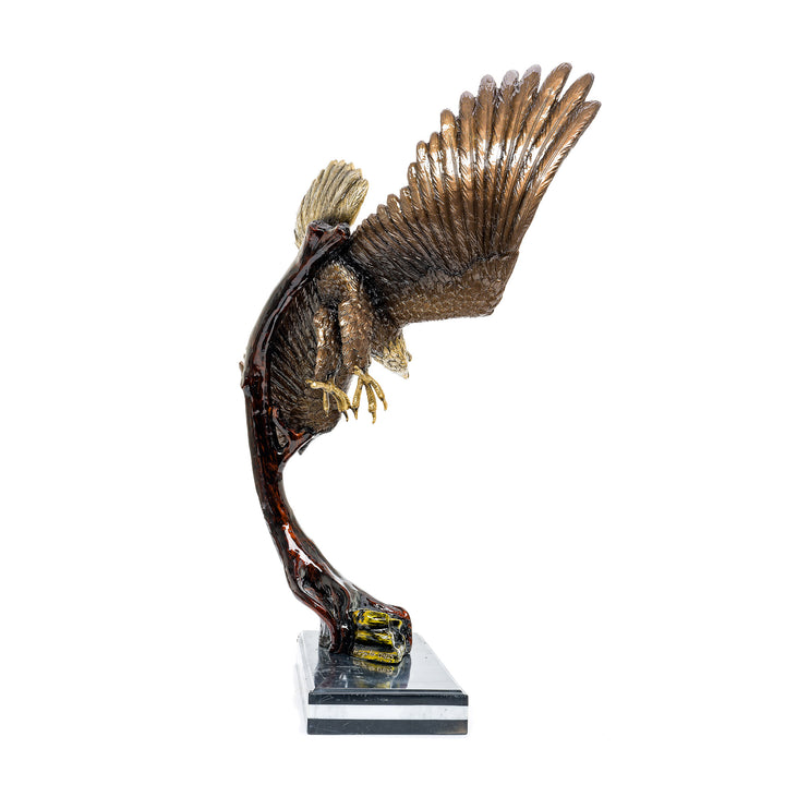 Dynamic eagle sculpture in bronze with custom vibrant patina by Muzika.