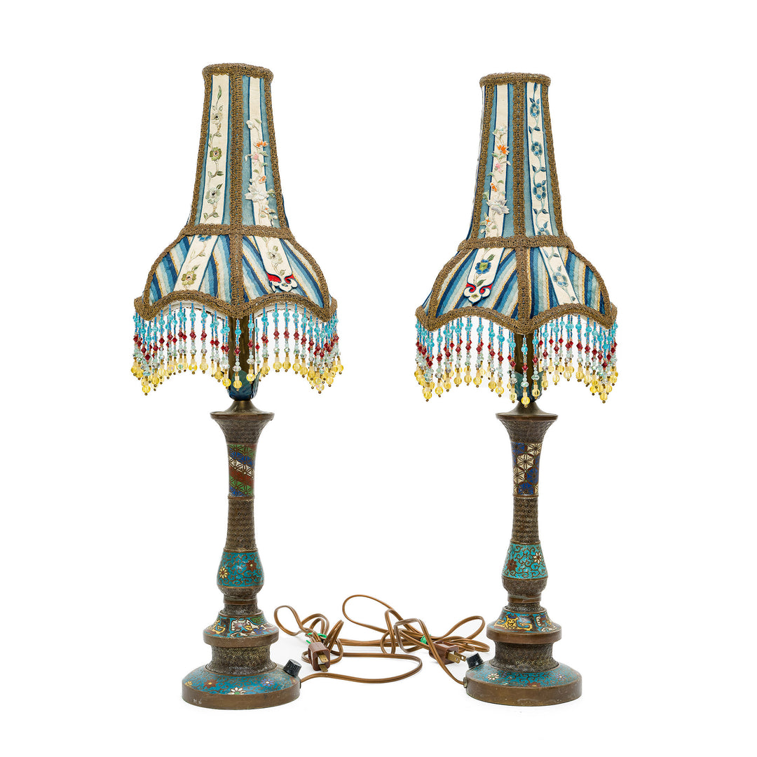 Elegant bronze lamps with beaded fringe detailing