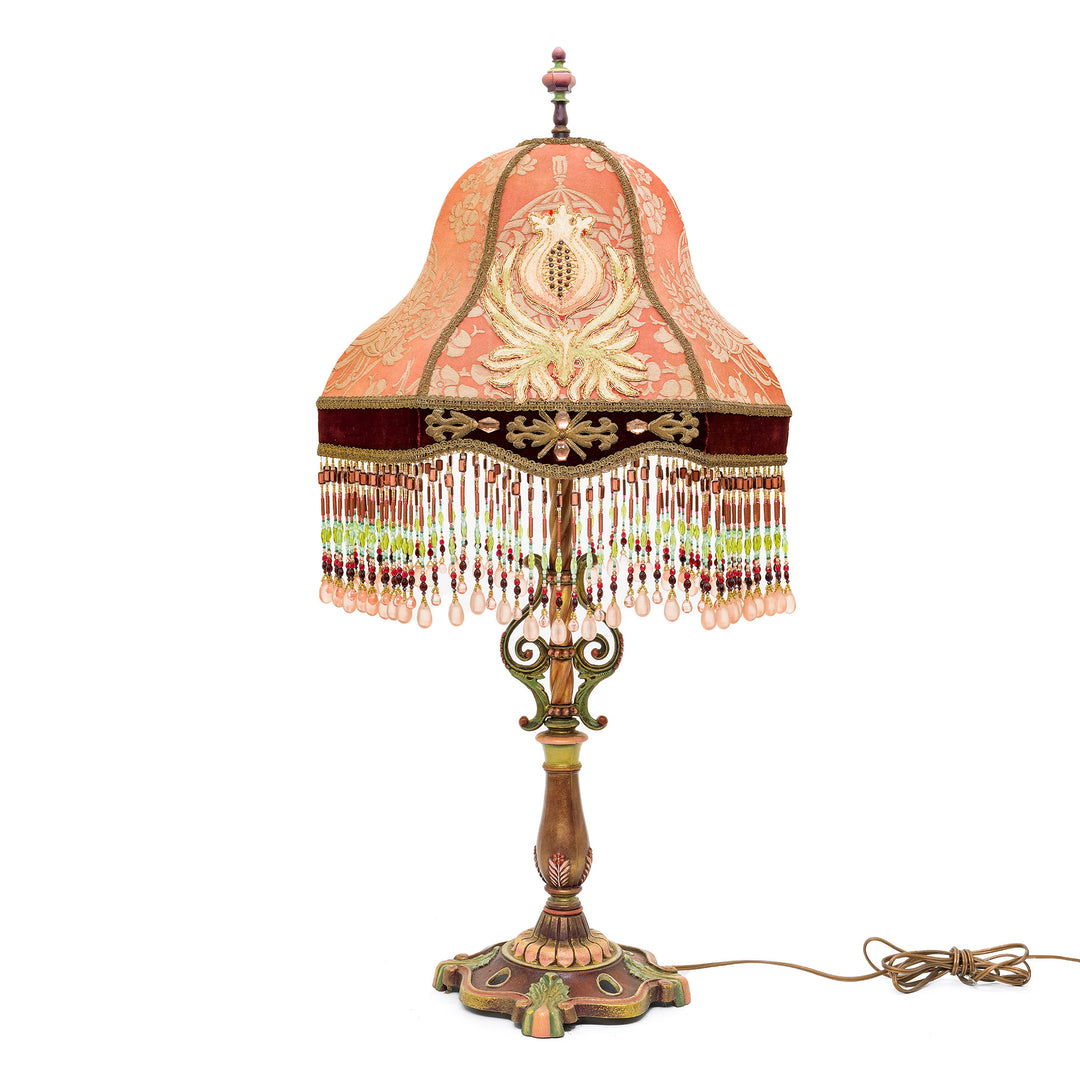 Elegant hand-embroidered lamp with intricate bronze base