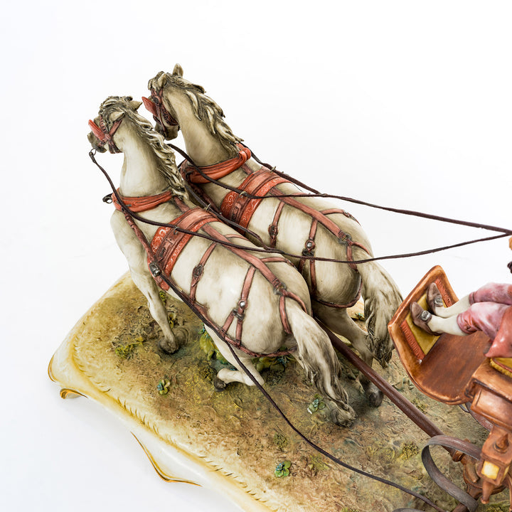 Elegant horse carriage in fine Capodimonte porcelain, handcrafted in Italy.