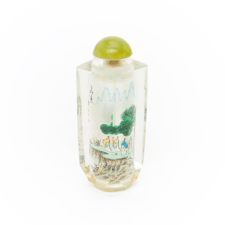 Elegant reverse painted bottle with lush mountain scenes