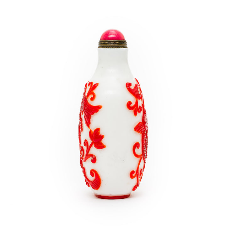 Elegant red and white snuff bottle with lotus details