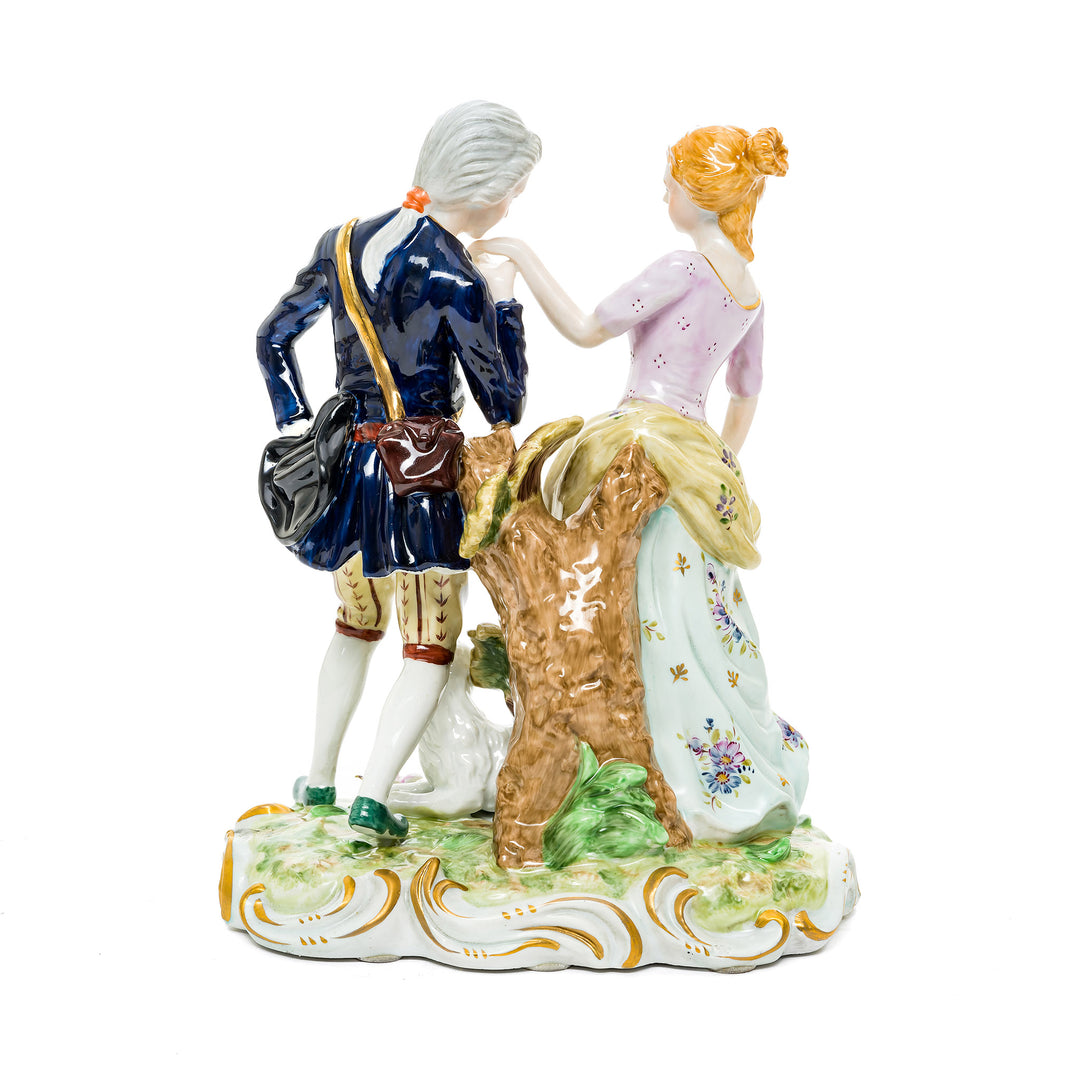 Elegant German porcelain figurine depicting a tender romantic moment between a couple in an 18th-century setting.