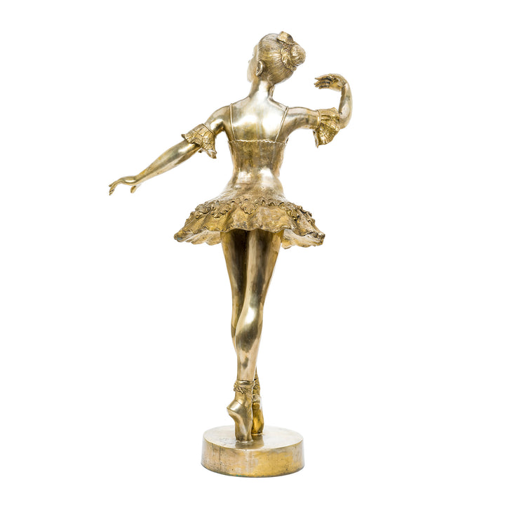 Exquisite bronze ballerina with detailed tutu and polished finish.