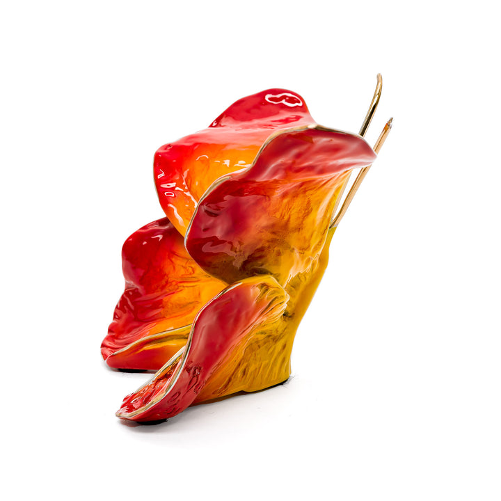Side view of flame-toned butterfly with sculpted wings