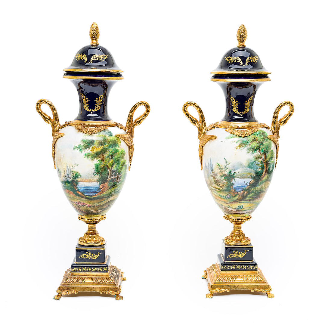 Pair of French Sevres-style porcelain urns with gilt bronze accents