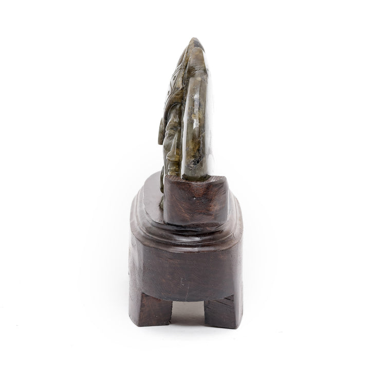 Compact gemstone sculpture of tribal leader