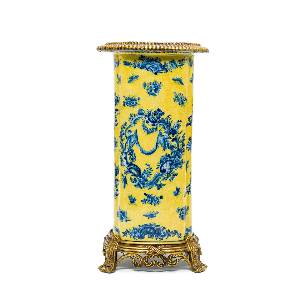 Detail of ribbed gilt metal rim on porcelain vase