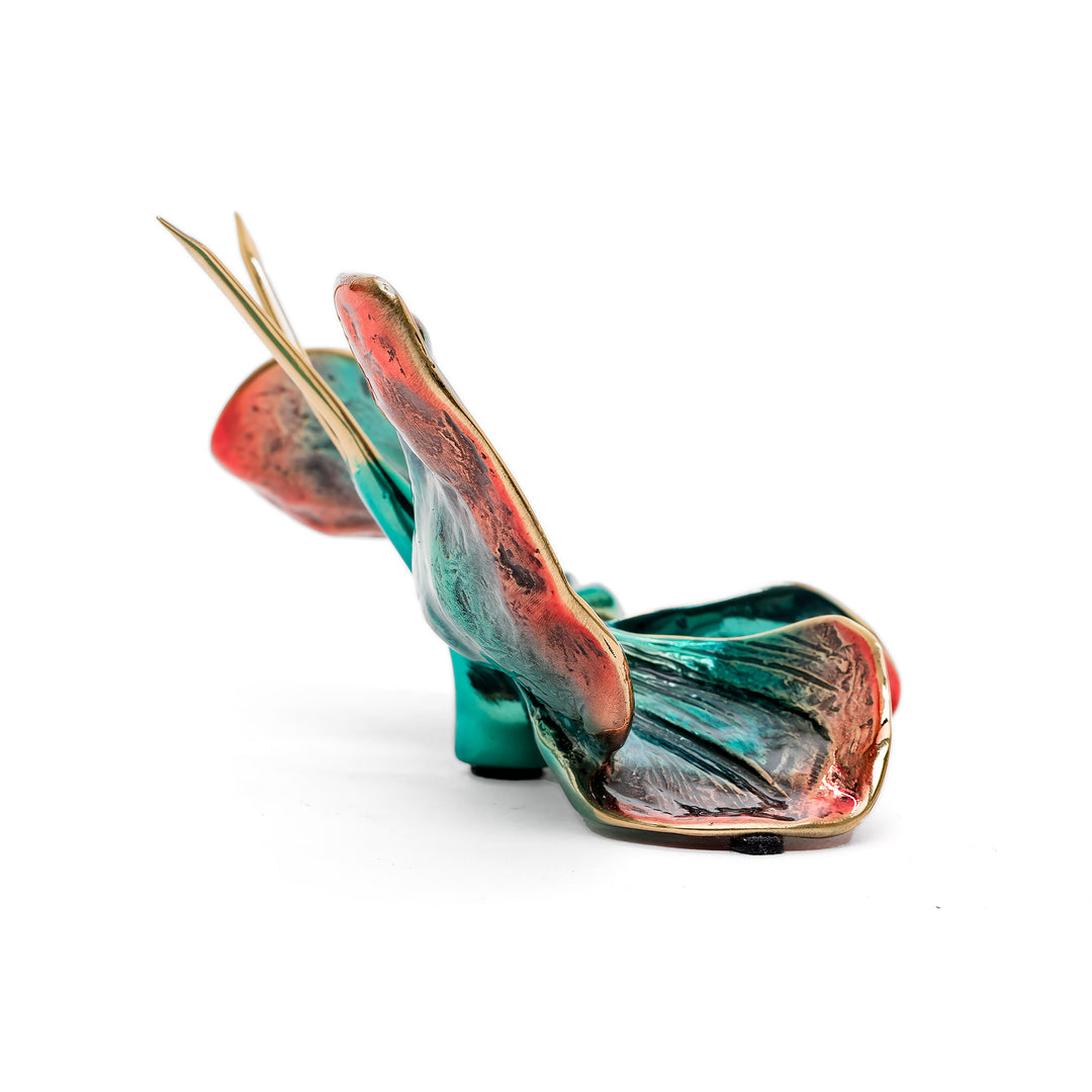 Glossy butterfly sculpture in aqua and red enamel