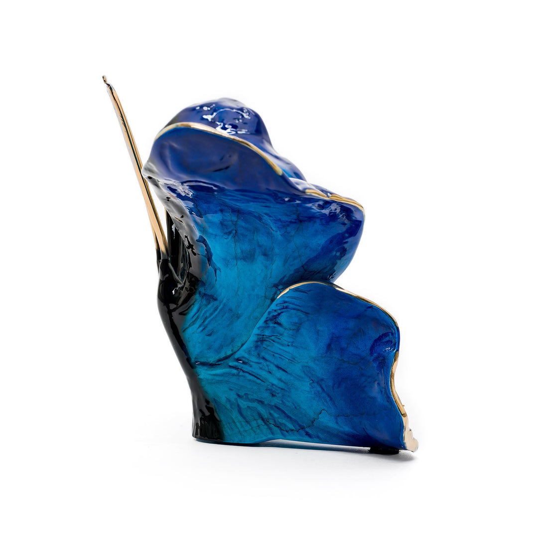 High-gloss blue enamel butterfly with gold accents